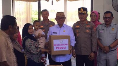 Bupati Ismet Mile Apresiasi Bhakti Kesehatan HUT Bhayangkara di Tilongkabila